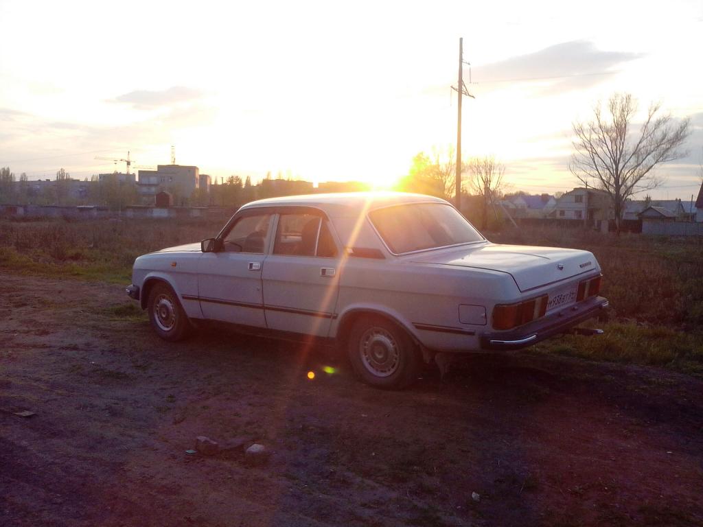 На закате.